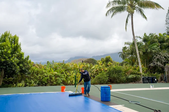 Court being resurfaced with fresh acrylic color coats in Hawaii